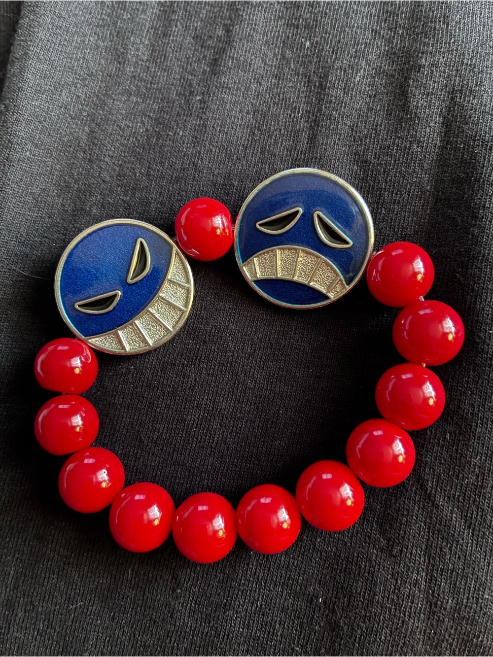 Anime Red Beaded Stretch Bracelet Silver Tone ONE PIECE Coin & Blue Face Charms